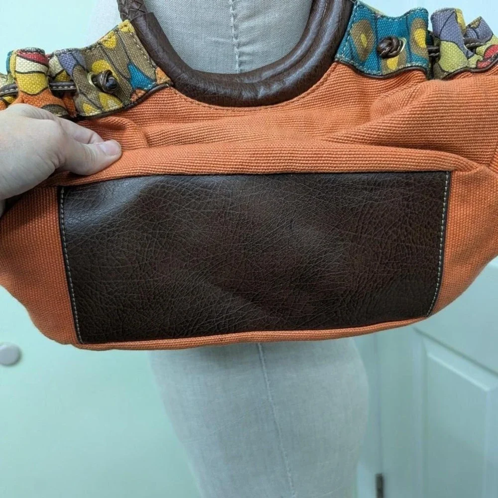Relic orange‎ canvas purse with brown leather trim and colorful fabric